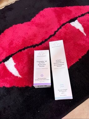 Drunk Elephant skincare  in white and purple packaging